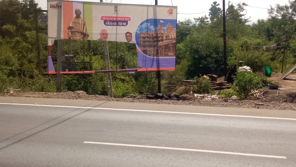 Angry tribals tore apart posters in the Narmada district