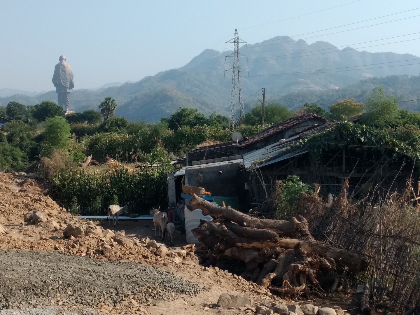 This one hut stands, about 500 metres from the statue, while others around it have been demolished. This spot used to be a village once.