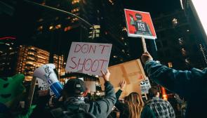 Anti-ICE signs during protest in San Diego. Photo: Micah Fong