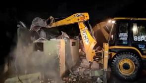Bulldozer action at Dum Dum station area.