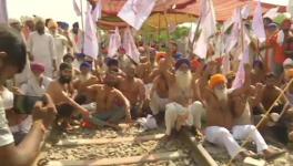 Farmers protest against Farm Bills.