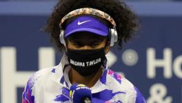 Naomi Osaka at US Open wearing mask with Breonna Taylor written on it.