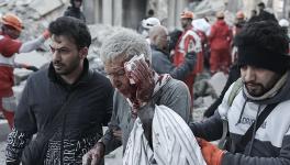 US-Israeli strikes on Tehran’s Enqelab Square. Photo: Press TV