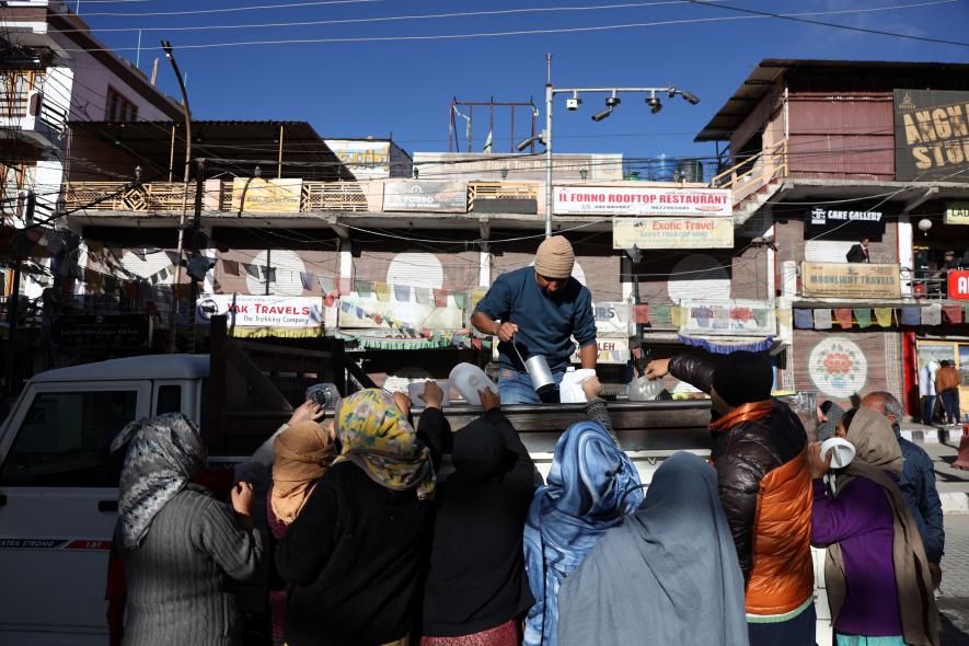Mohsin, 36-year-old milkman, collects milk from the people in Sheeshot, a village on the city's outskirts, and brings it to the Leh market.