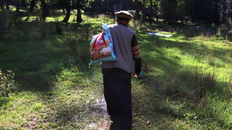 After offering prayers at his relative’s grave in the only Bakerwal graveyard in Ganiwan, Ganderbal nearly 50 km away, 75-year old Muhammad Sadiq walks toward his tent high in the mountains (Photo - Ahsaan Ali, 101Reporters)