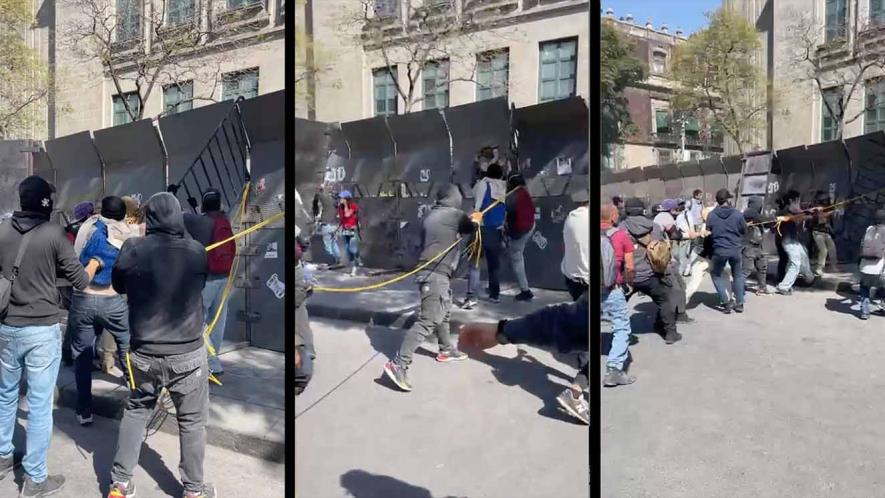 Protesters tearing down steel fence in the Zócalo Mexico City. Screenshots via José Luis Granados Ceja
