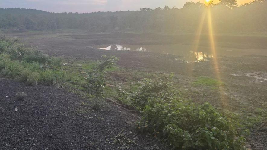 The pond still exists, its embankments neatly paved and chairs placed along the retention wall. But it barely holds water. (Photo - Sanavver Shafi, 101Reporters)