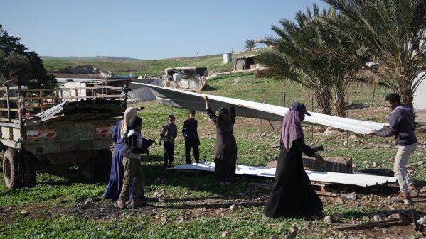 Palestinian residents of Ras Ein al-Auja village, West Bank pack up their belongings and prepare to leave their homes after deciding to flee mounting settler violence. Photo: AP